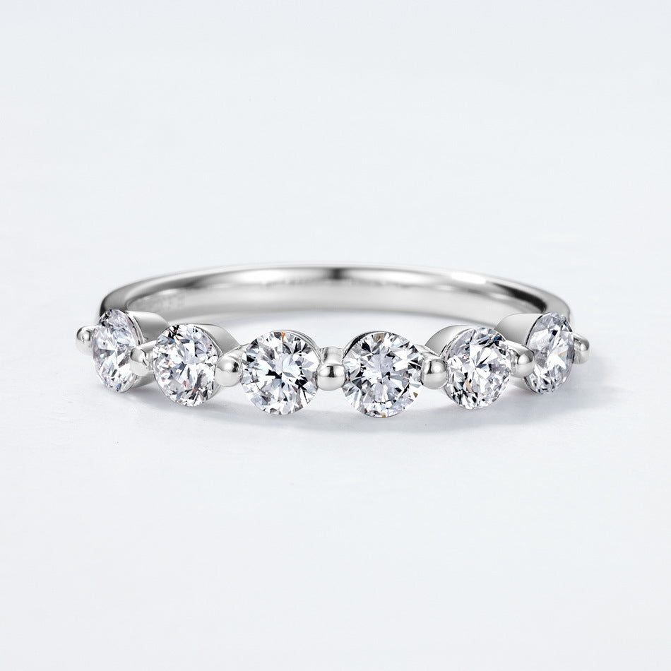 Round brilliant diamond simulant 7-stone half-eternity anniversary wedding band ring in 925 silver.