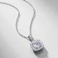Perspective view of round diamond cushion halo pendant necklace.