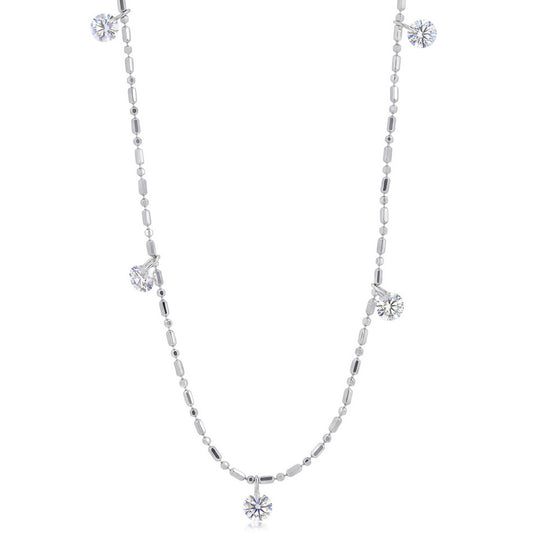 Round cut lab grown diamond dangle charm station necklace in 925 sterling silver.