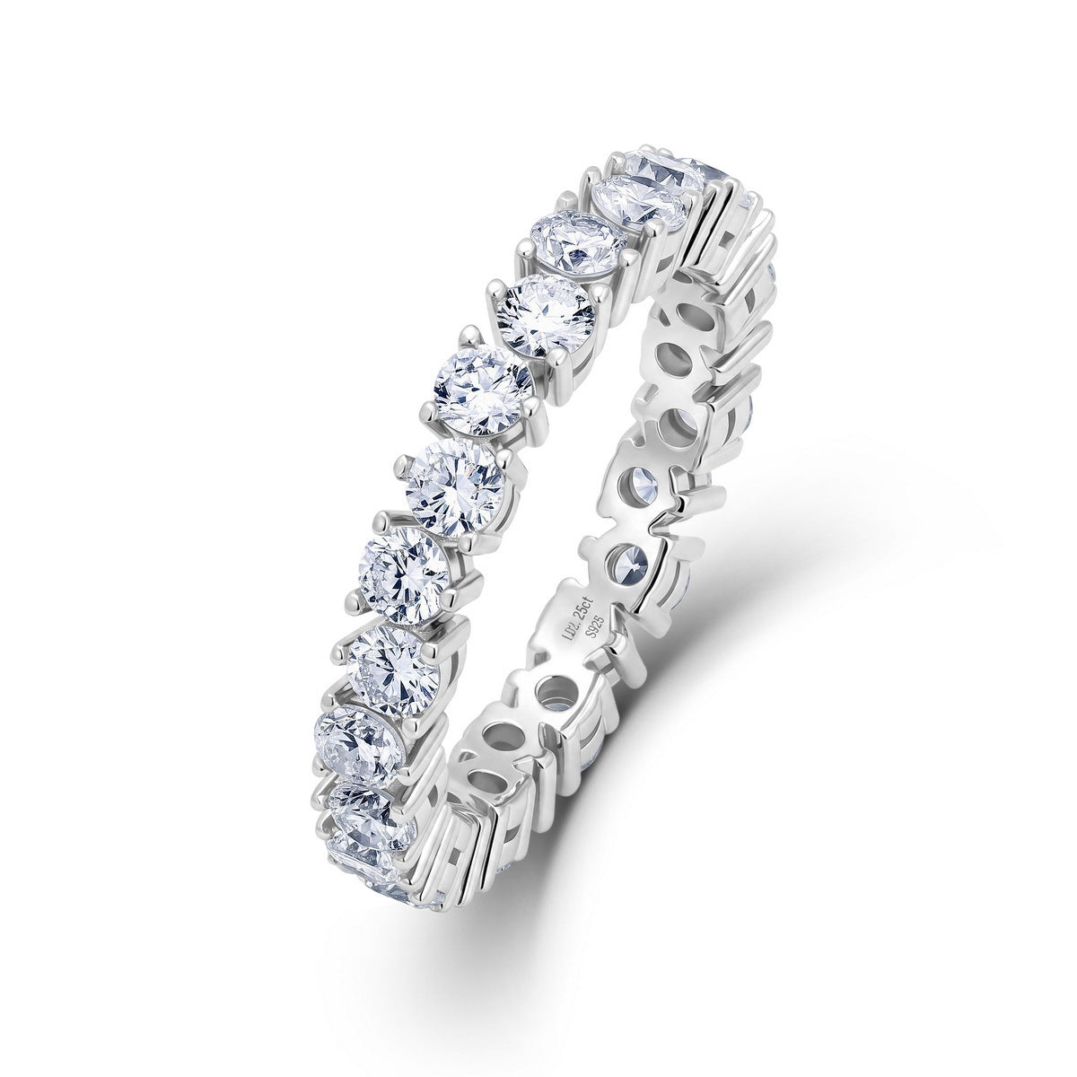 Round cut lab grown diamond eternity ring in sterling silver isolated on white background