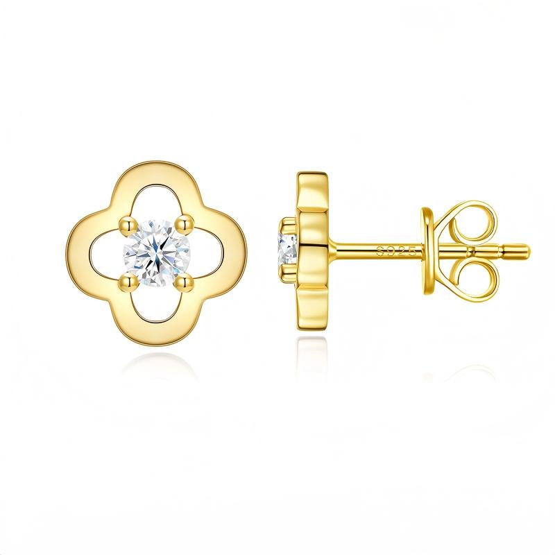 Gold openwork four-leaf clover stud earrings with round moissanite solitaire center on white background.