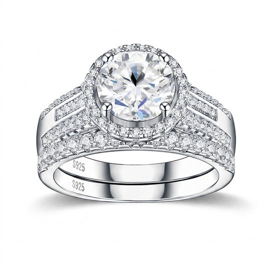 Round cut moissanite halo engagement ring with multi-row pave matching band on white background.