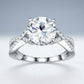 Round cut moissanite twisted vine engagement ring in 925 sterling silver, front view showcasing brilliant center stone.
