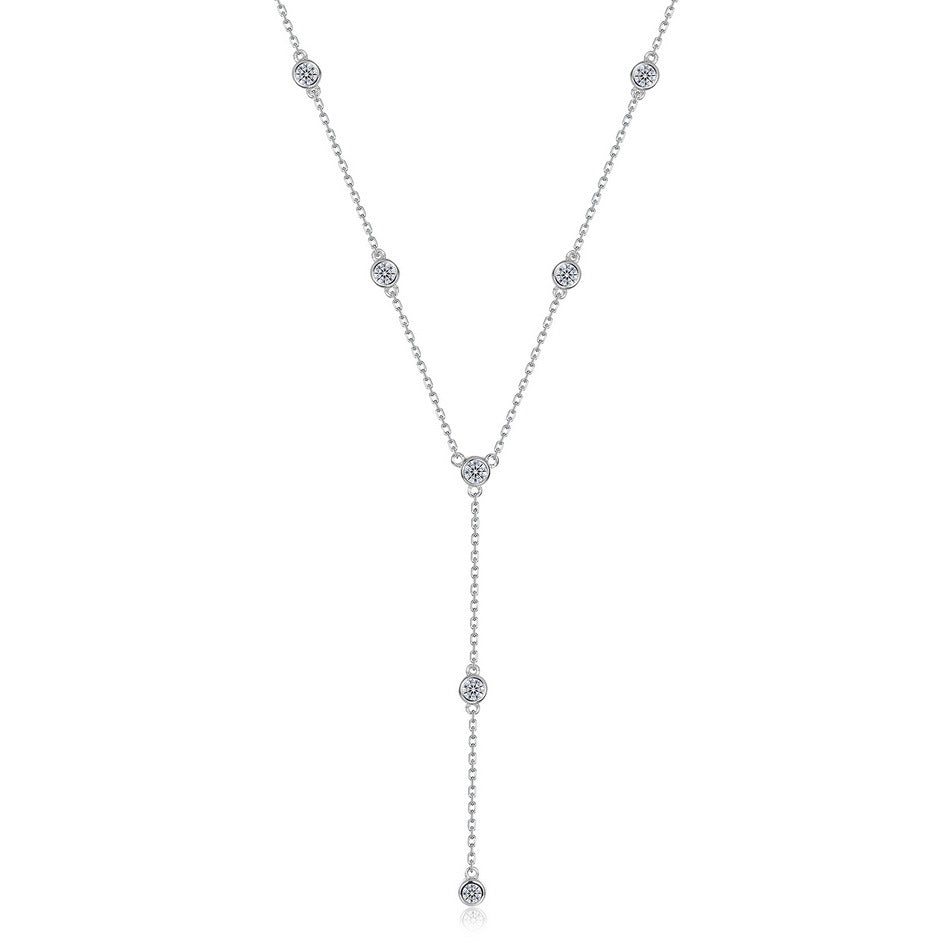 Round cut diamond bezel-set station Y-necklace with lariat drop chain in 925 silver.