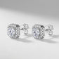 Pair of round diamond cushion halo stud earrings in platinum-plated 925 sterling silver.