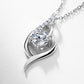 Round diamond intertwined swirl solitaire pendant displayed on textured dark background.
