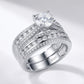 Angled view of round moissanite solitaire and interlocking multi-row pave band.