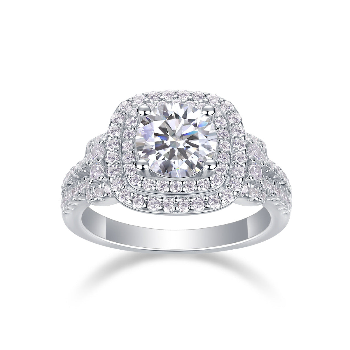 Front view showing round moissanite centerpiece framed by cushion double halo and pave split shank.