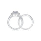 Side profile view showing round moissanite cushion double halo ring and matching curved pave band.