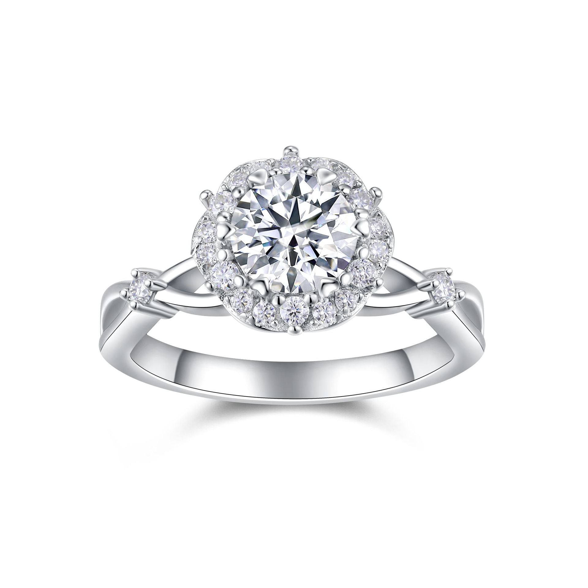 Round moissanite floral halo ring with vine twisted shank on white background.