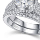 Macro view showing double S925 hallmarks and multi-row pave band on halo moissanite ring set.