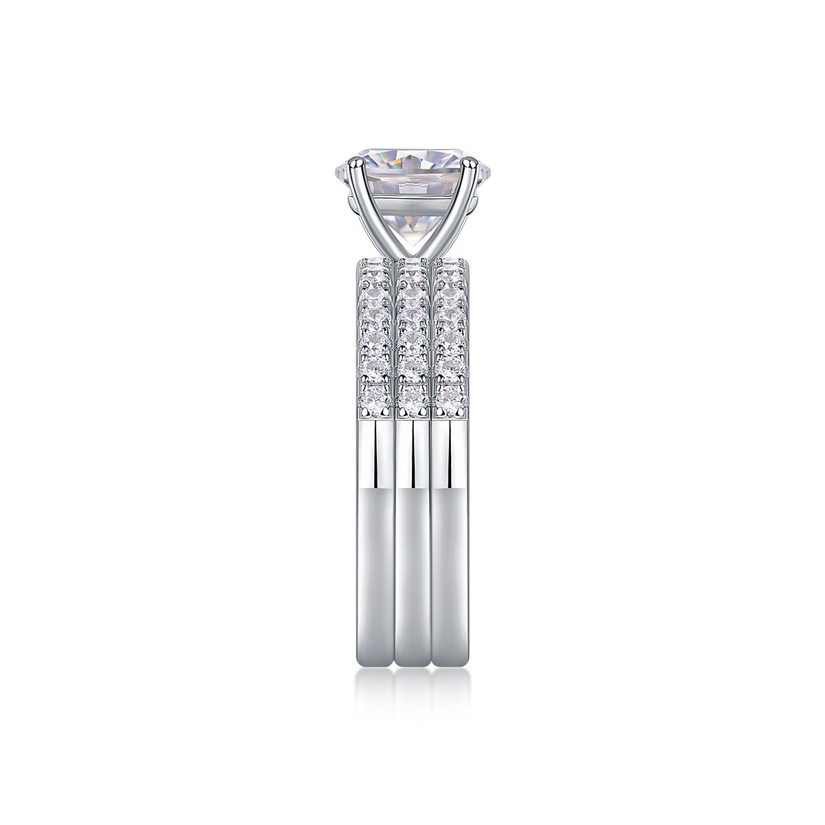 Side view profile showing flush fit alignment of round moissanite solitaire and pave wedding band.