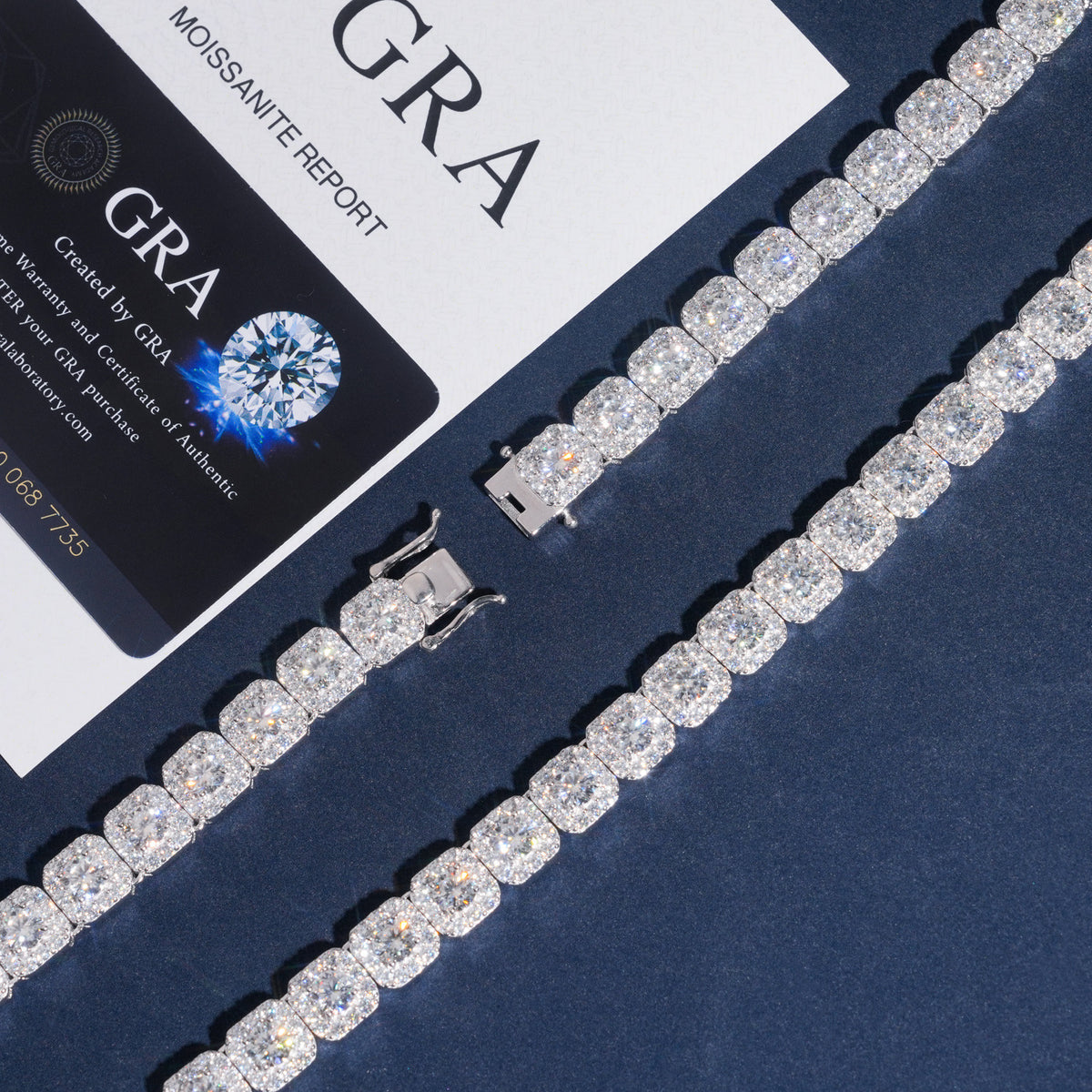 Angled view showing dual widths of round moissanite square cushion halo tennis bracelets with GRA card