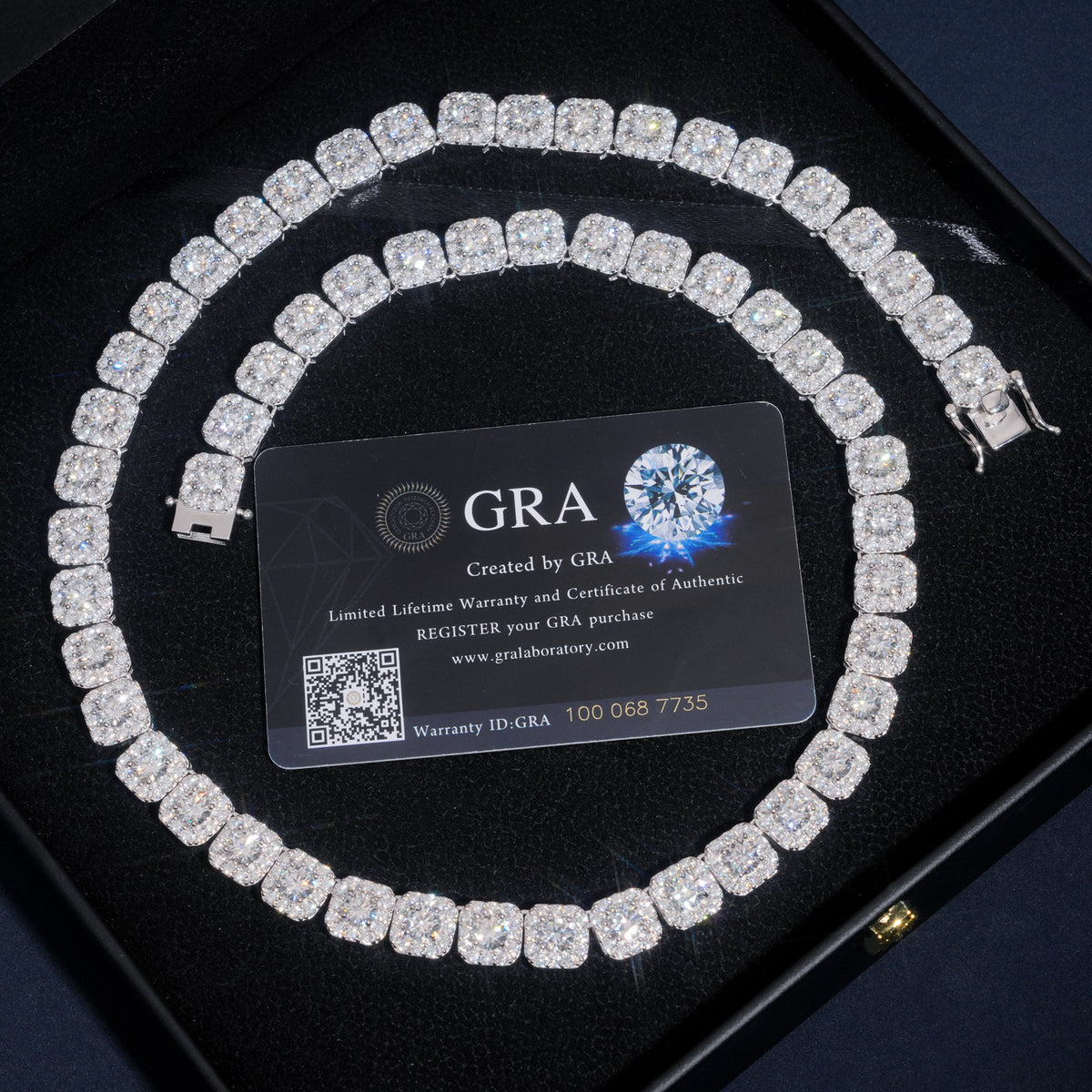 Round moissanite square cushion halo tennis bracelet presented in black display box with GRA certificate