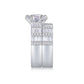 Side view showing flush fit of round moissanite engagement ring and wide baguette band.