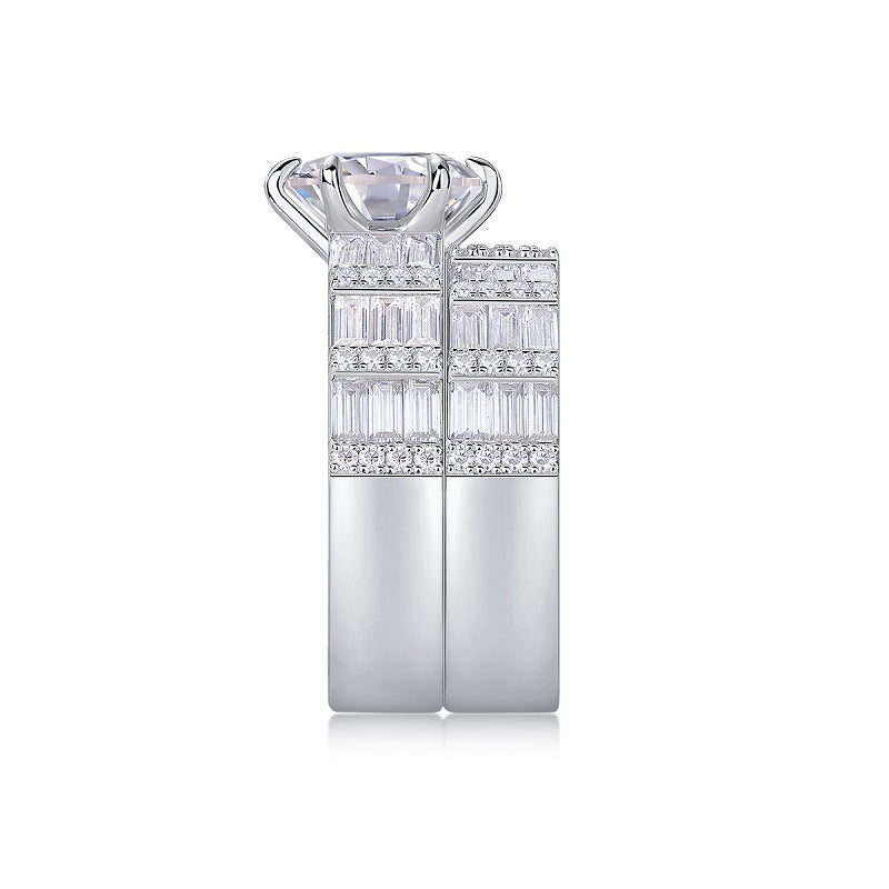 Side view showing flush fit of round moissanite engagement ring and wide baguette band.