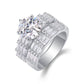 Side profile view showing interlocking wide baguette moissanite bridal ring set.