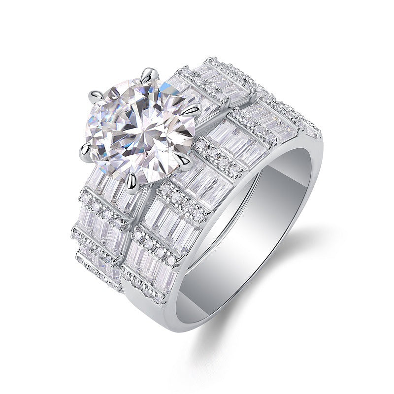 Side profile view showing interlocking wide baguette moissanite bridal ring set.