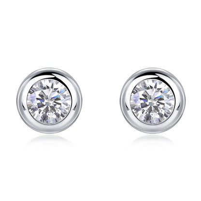Pair of round solitaire bezel set diamond stud earrings in 925 sterling silver.