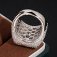 Side angle view of S925 silver iced out moissanite baguette square cluster ring on dark background   