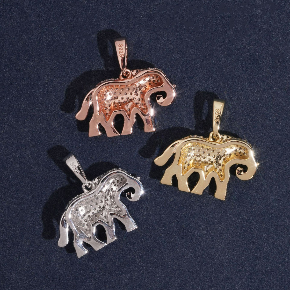 Polished back view of S925 sterling silver iced out moissanite elephant pendants in rose gold silver and gold