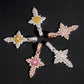 S925 silver iced out moissanite floral cluster cross pendants in pink yellow clear stones arranged in a star pattern