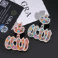 Rose gold and silver S925 multi-color moissanite Arabic Allah pendants displayed with GRA certificates