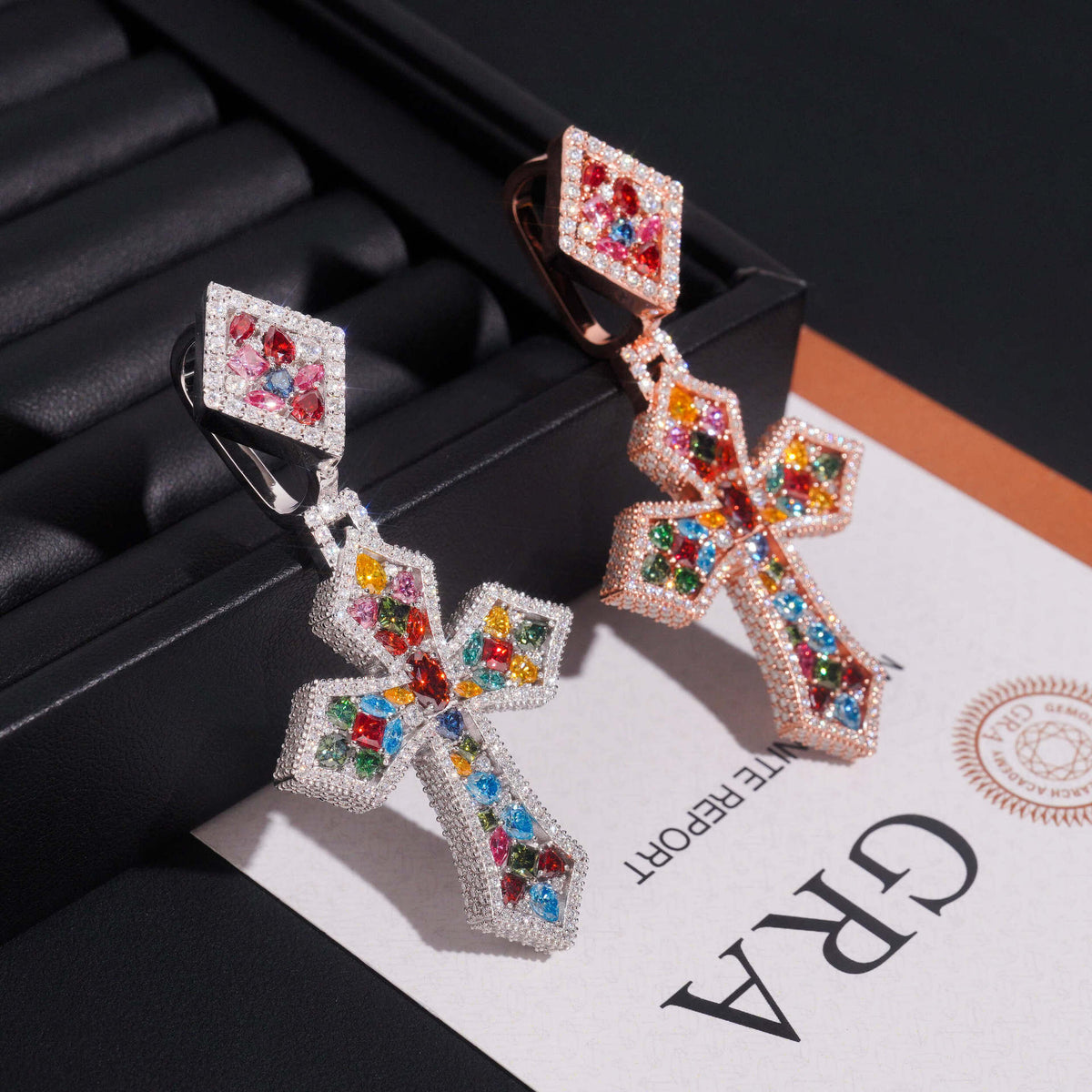 S925 silver multi-color moissanite cross pendants displayed on luxury GRA report card and box