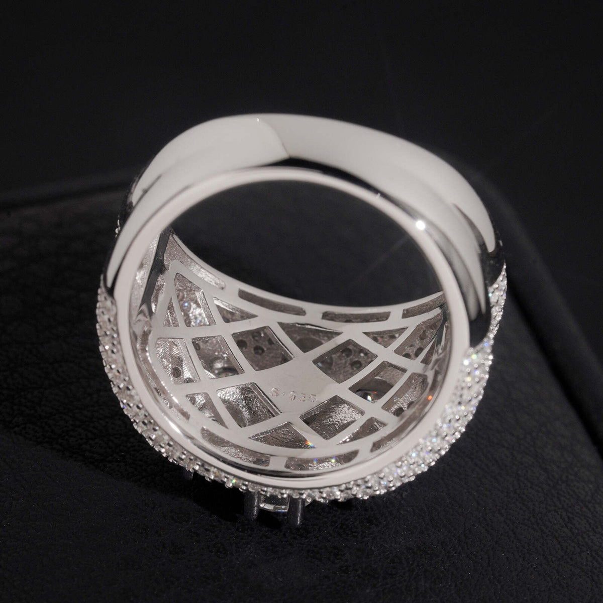 Inside band view showing lattice hollow pattern of seven stone flower cluster moissanite wide ring