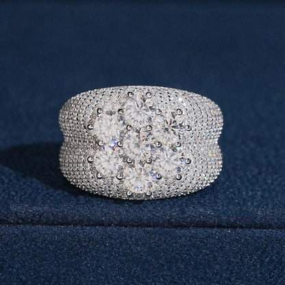 Seven stone flower cluster moissanite wide band ring with pave stones on dark blue display box