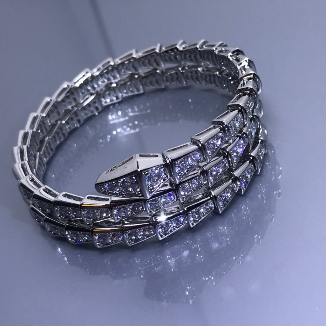 Zerra Jewelry BVLGARI Serpenti Viper Double bracelet with pave diamonds, featuring intricate serpent design and sparkling gemstone accents.