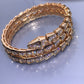 BVLGARI Serpenti Viper Double bracelet with pave diamonds, showcasing intricate snake design and sparkling gemstone accents.