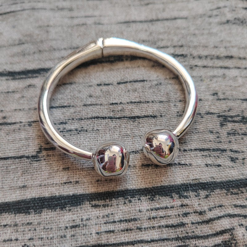 UNOde50 Bangle bracelet with double ball