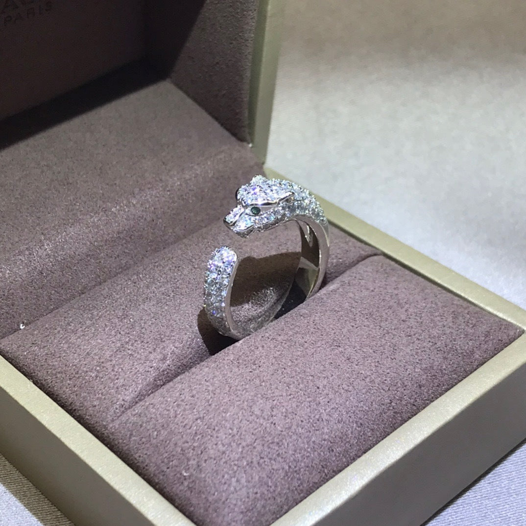 Zerra Jewelry Cartier Panthère de Narrow ring with pave setting, featuring a sleek gold band with intricate panther design.