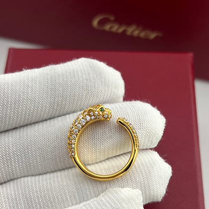 Zerra Jewelry Cartier Panthère de Narrow ring with pave setting, featuring a sleek gold band with intricate panther motifs.