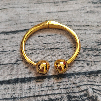 UNOde50 Bangle bracelet with double ball