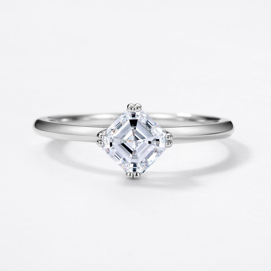 Square emerald cut kite set solitaire engagement ring in 925 sterling silver.