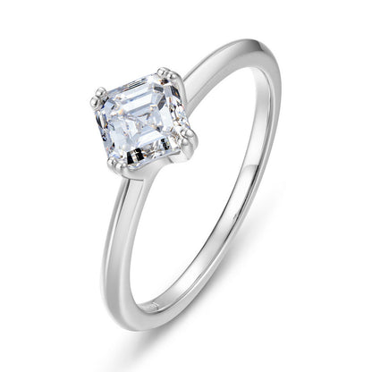 Angled side view of square emerald cut solitaire ring showing slender band.