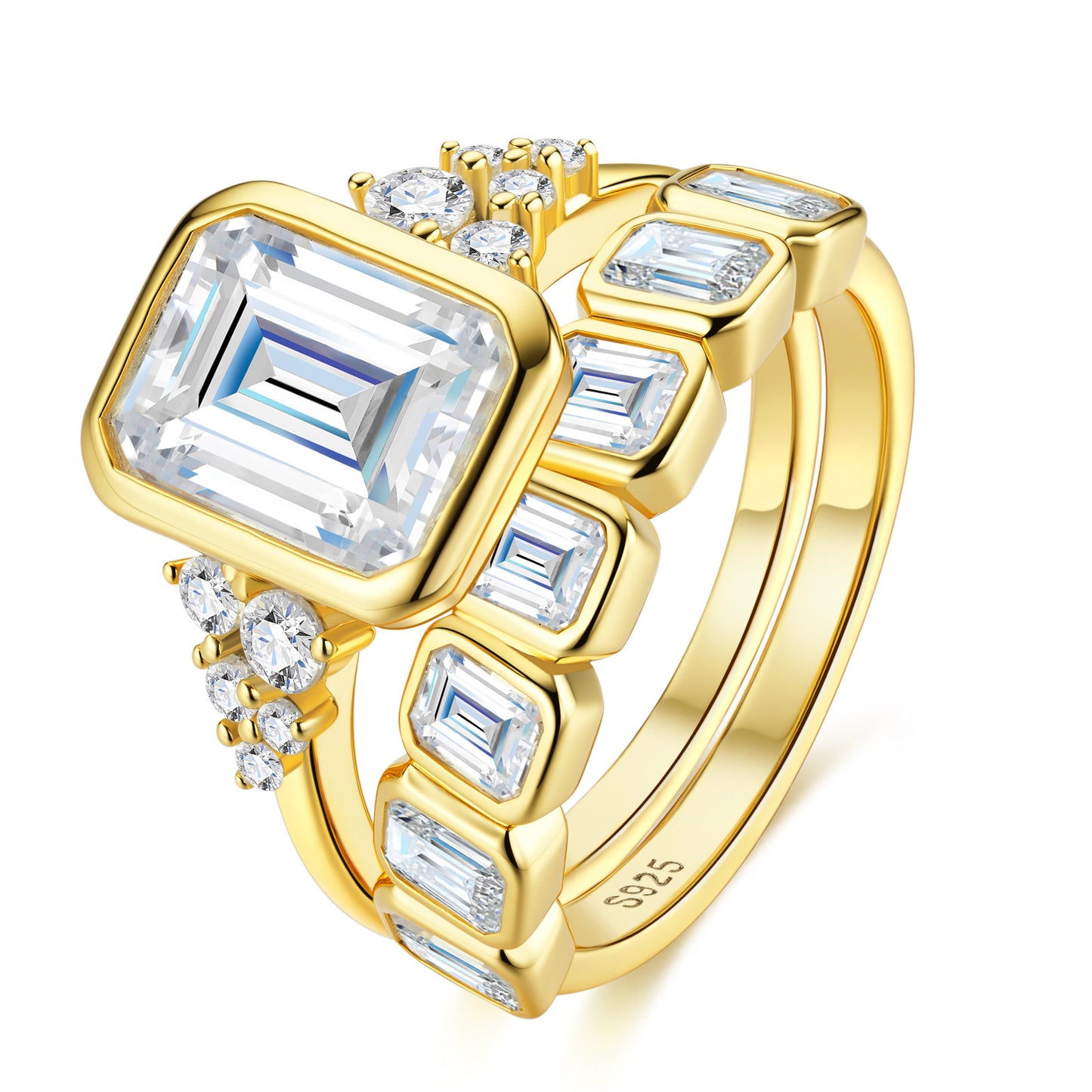 Studio perspective display of gold bezel set emerald cut moissanite engagement ring and matching eternity wedding band set.