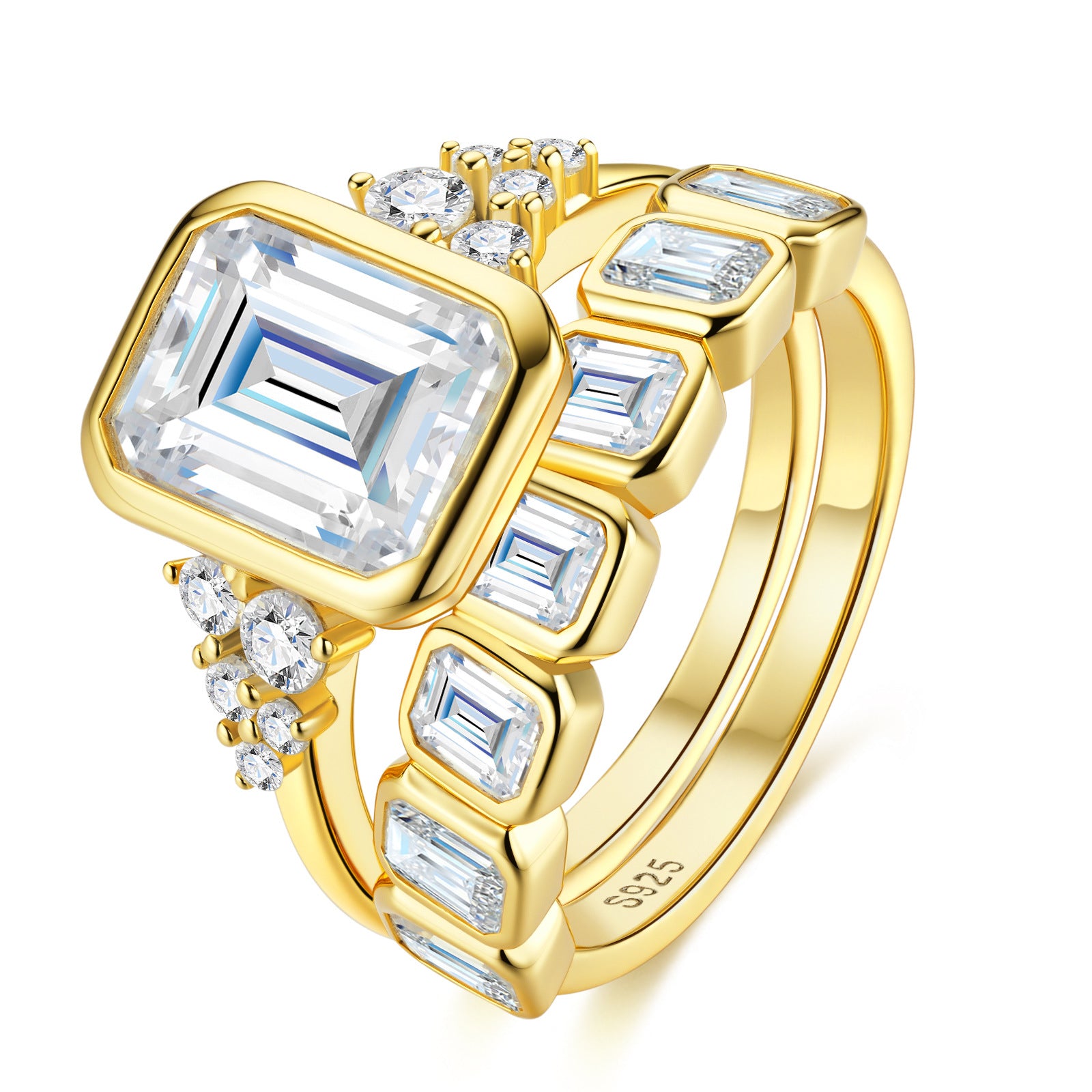 Studio perspective display of gold bezel set emerald cut moissanite engagement ring and matching eternity wedding band set.