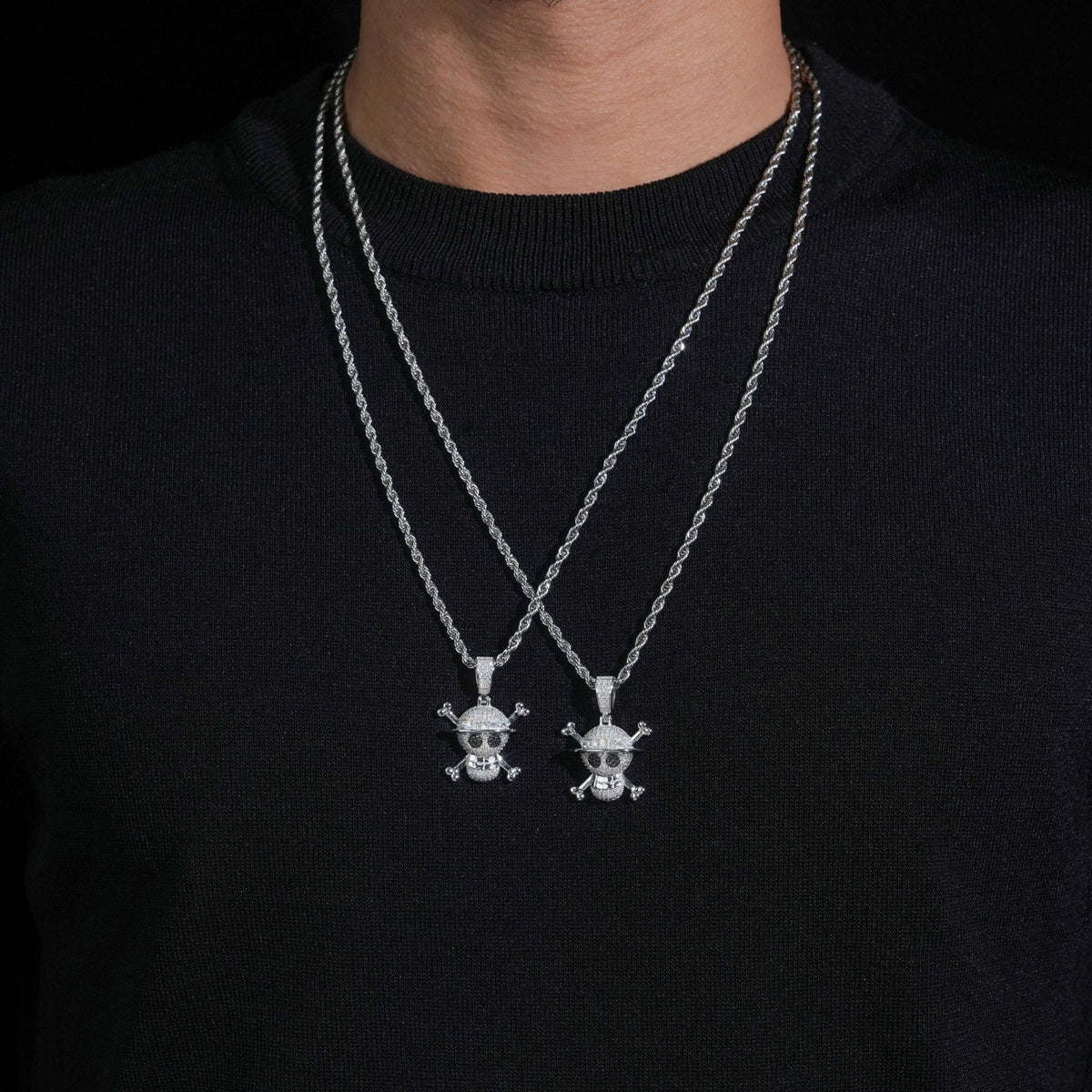 Model wearing layered S925 sterling silver iced out moissanite straw hat pirate skull pendant necklaces