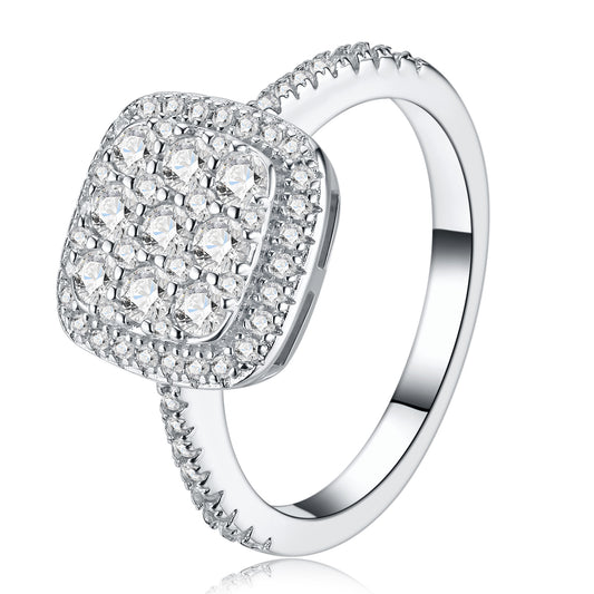 Studio display of sugar cube halo cluster moissanite engagement ring featuring double cushion halo and pave band.