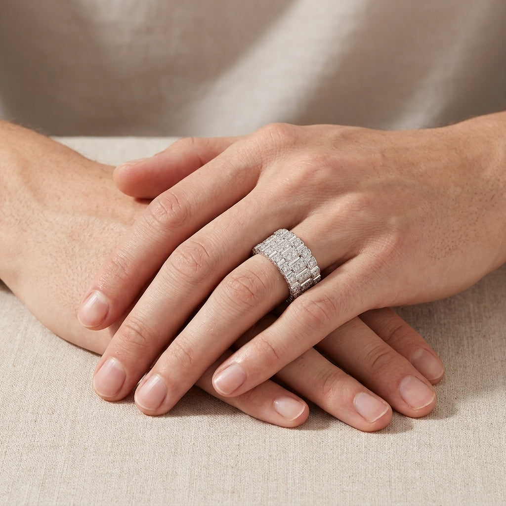 Person wearing three row watch link moissanite wide band ring on finger