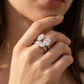 Model wearing two piece Toi et Moi oval and marquise moissanite stacking ring set.