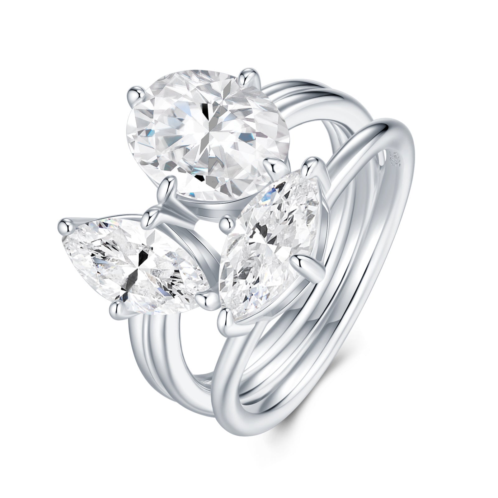 Angled view of interlocking Toi et Moi oval and marquise moissanite ring set.