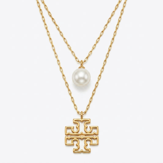 Tory Burch Britten Double Strand Necklace in 18k gold-plated finish with layered chains and logo