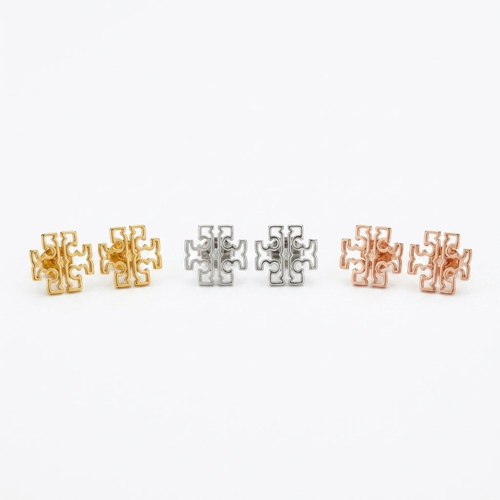 Tory Burch Britten Logo Stud Earrings in 18k gold-plated brass featuring a cut-out Double T design