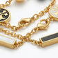 Detailed view of the secure lobster clasp and the adjustable extender on the gold pearl bracelet
