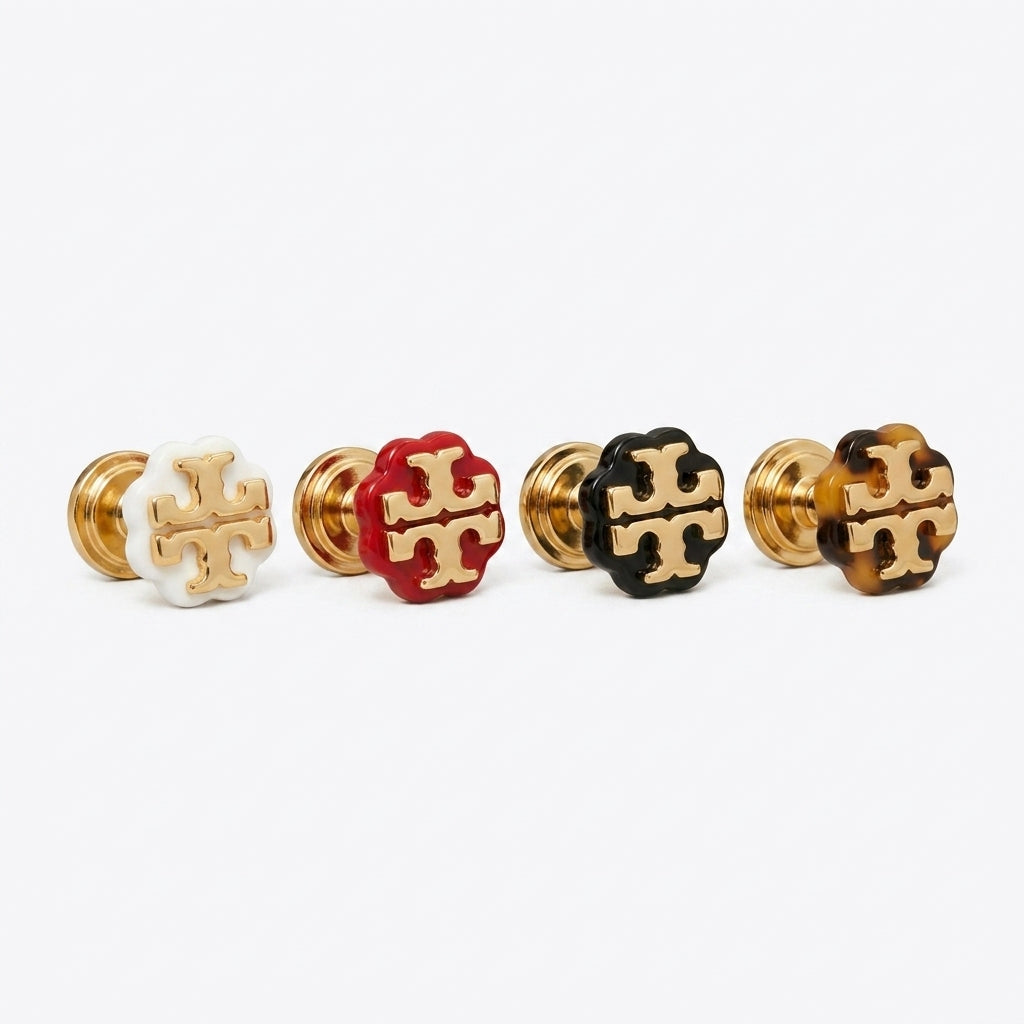 Tory Burch Double Tone Stud Earrings featuring a mixed metal gold and silver Double T logo