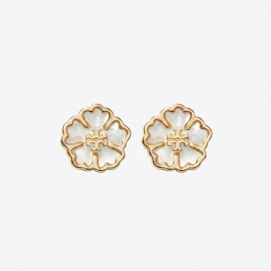 Tory Burch Forget Me Not Earrings featuring a gold floral design with the signature Double-T logo in the center.